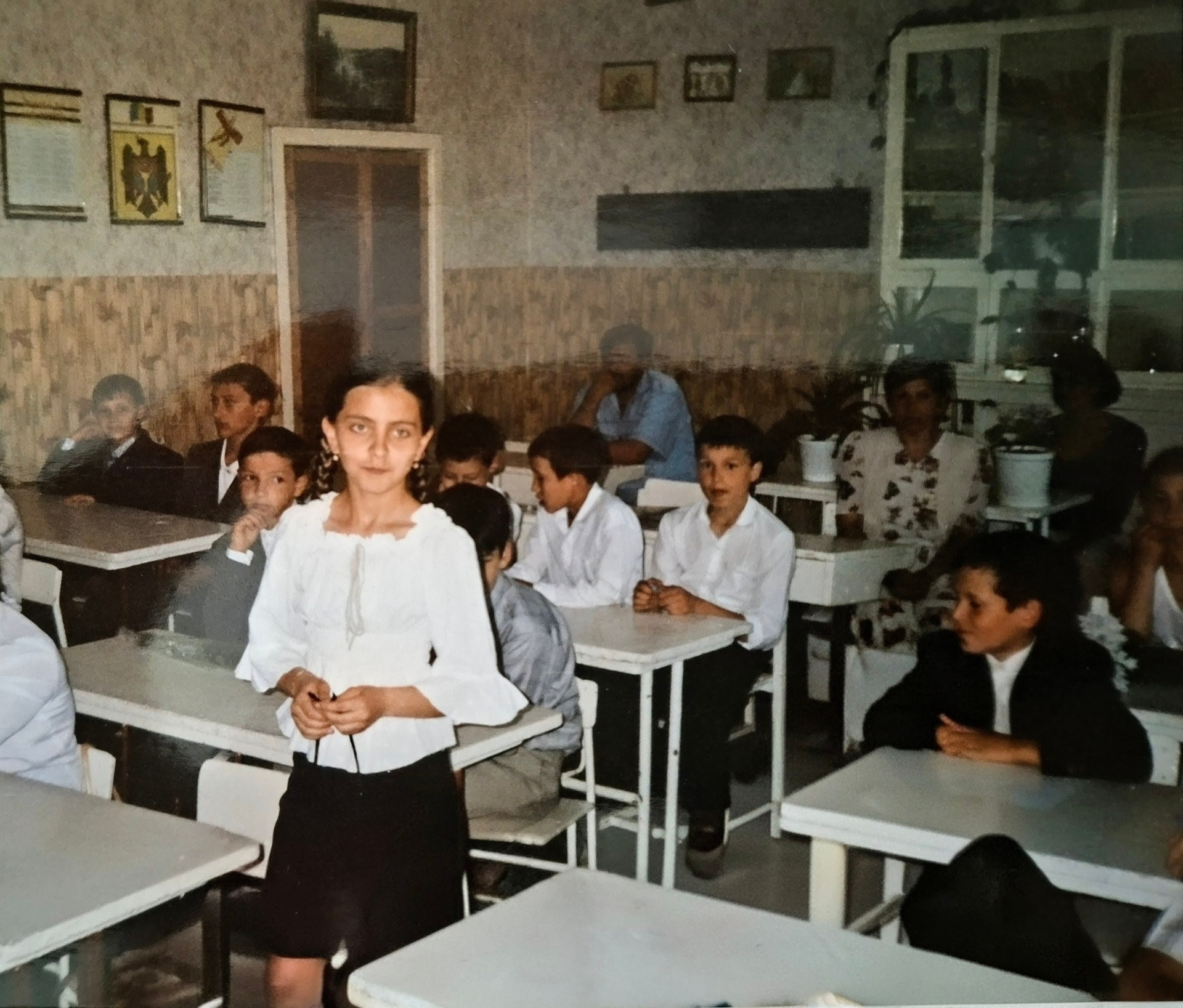 Elena Mihalas as a schoolgirl in her classroom
